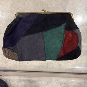 Vintage Small leather/suede patchwork clutch with kiss lock close.
